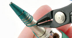 Flush cutter cutting the end of the wire